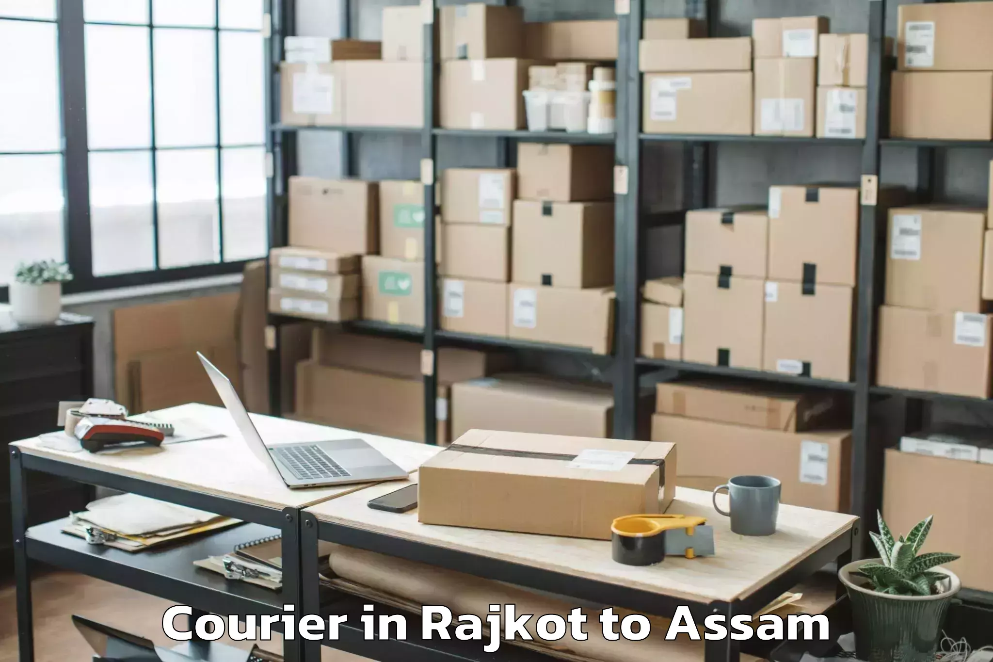 Easy Rajkot to Bokajan Courier Booking